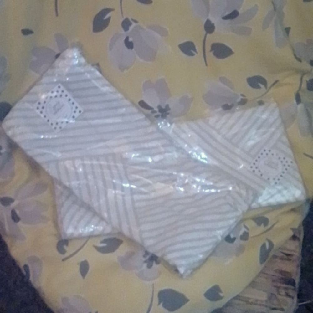 Simply Whimsical towels for kitchen and or bath in grayish color and design